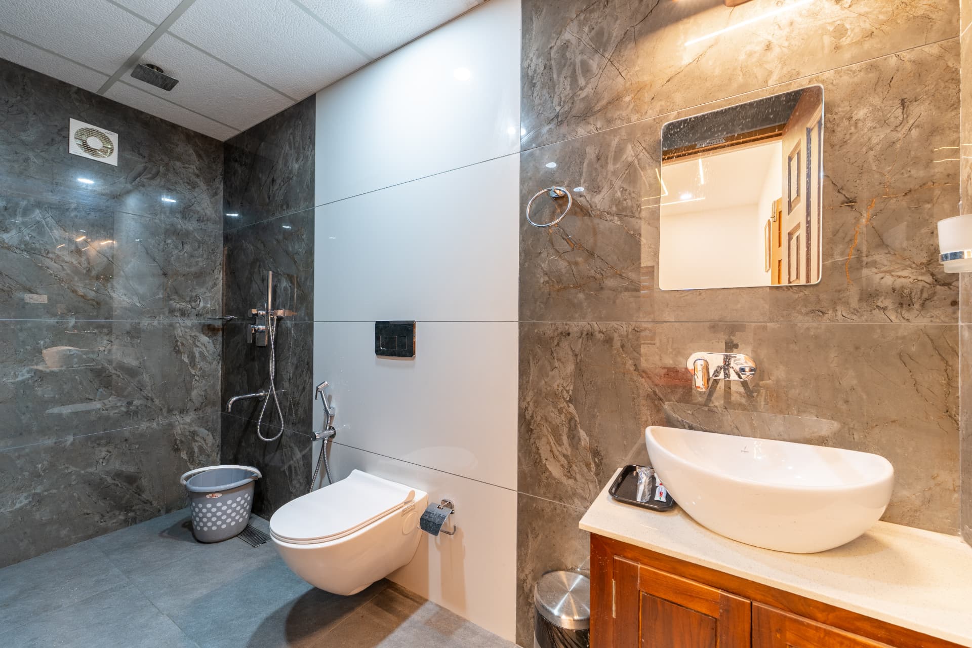 Marble attached bathroom with rain shower