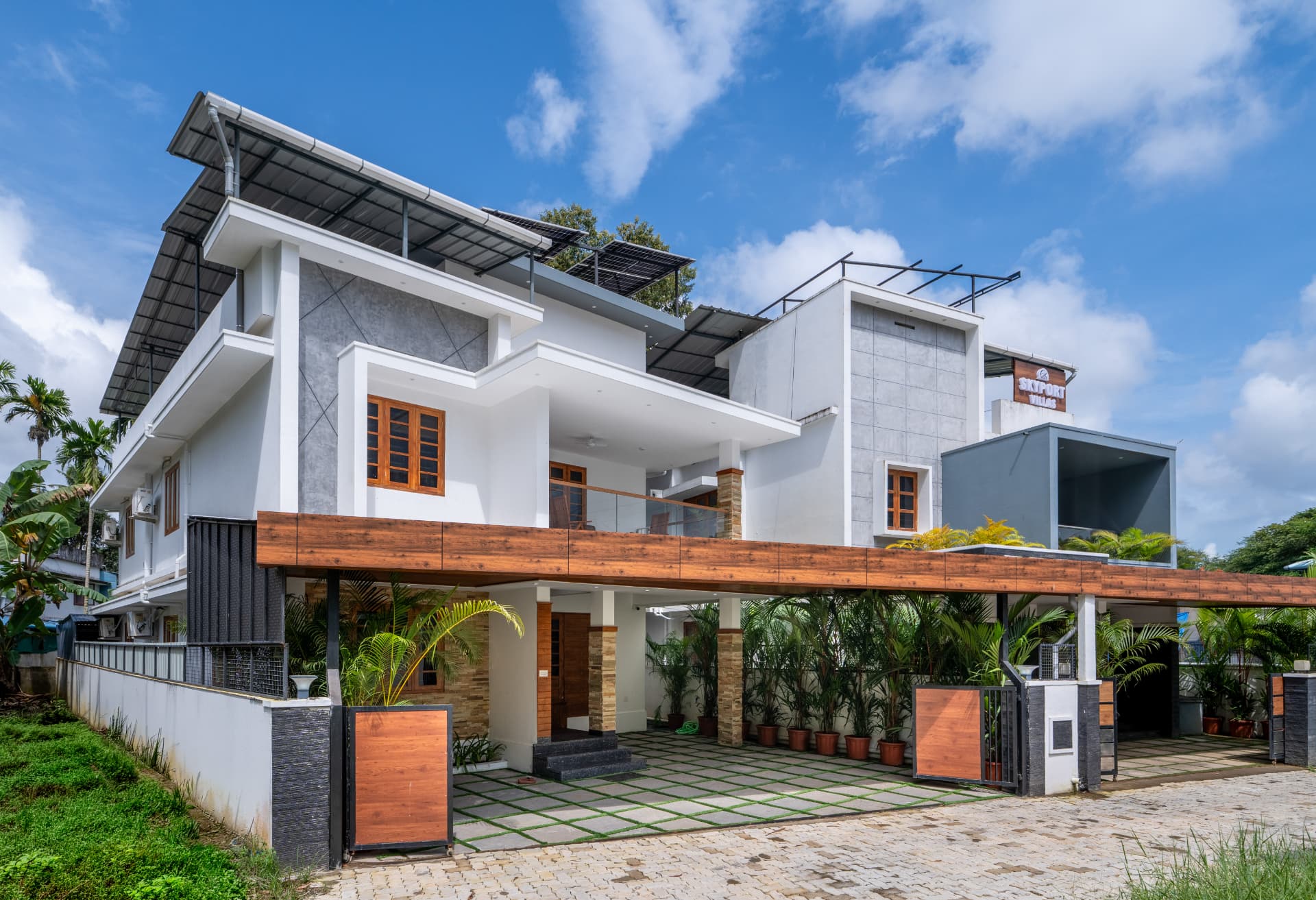 Side view of Skyport Villa and driveway